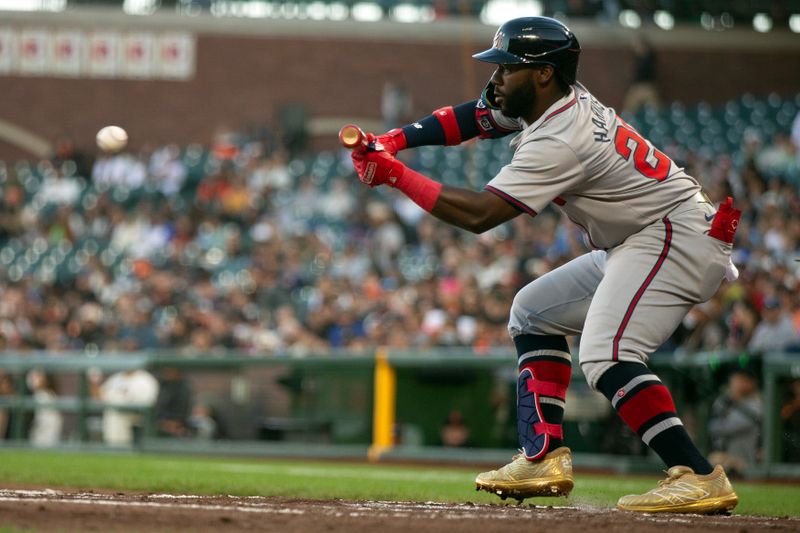 Aug 14, 2024; San Francisco, California, USA; Atlanta Braves center fielder Michael Harris II (23) fakes a bunt against the San Francisco Giants during the third inning at Oracle Park. Mandatory Credit: D. Ross Cameron-USA TODAY Sports