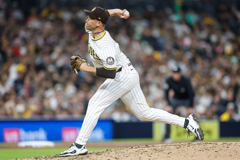 Apr 12, 2025; San Diego, California, USA; San Diego Padres relief pitcher Jason Adam (40) throws a pitch during the eighth inning against the Colorado Rockies at Petco Park. Mandatory Credit: David Frerker-Imagn Images