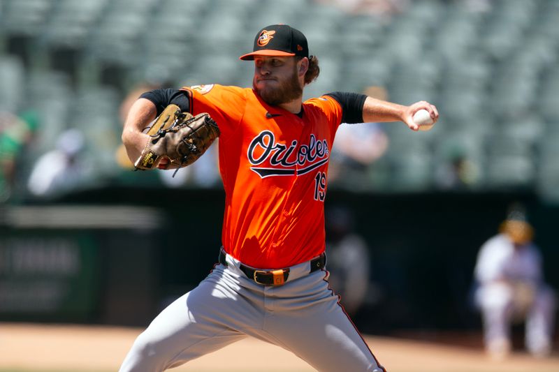 Jul 6, 2024; Oakland, California, USA; Baltimore Orioles pitcher Cole Irvin (19) delivers a pitch against the Oakland Athletics during the fourth inning at Oakland-Alameda County Coliseum. Mandatory Credit: D. Ross Cameron-USA TODAY Sports