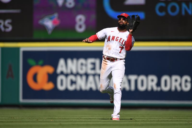 Oct 1, 2023; Anaheim, California, USA; Los Angeles Angels right fielder Jo Adell (7) makes a catch against the Oakland Athletics during the ninth inning at Angel Stadium. Mandatory Credit: Jonathan Hui-USA TODAY Sports