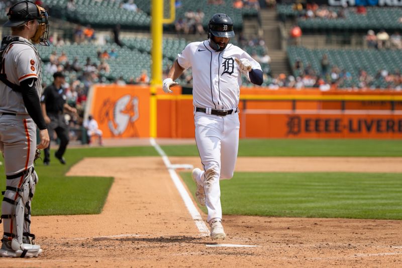 Jul 24, 2023; Detroit, Michigan, USA; Detroit Tigers center fielder Riley Greene (31) scores a run in the fifth inning against the San Francisco Giants at Comerica Park. Mandatory Credit: David Reginek-USA TODAY Sports