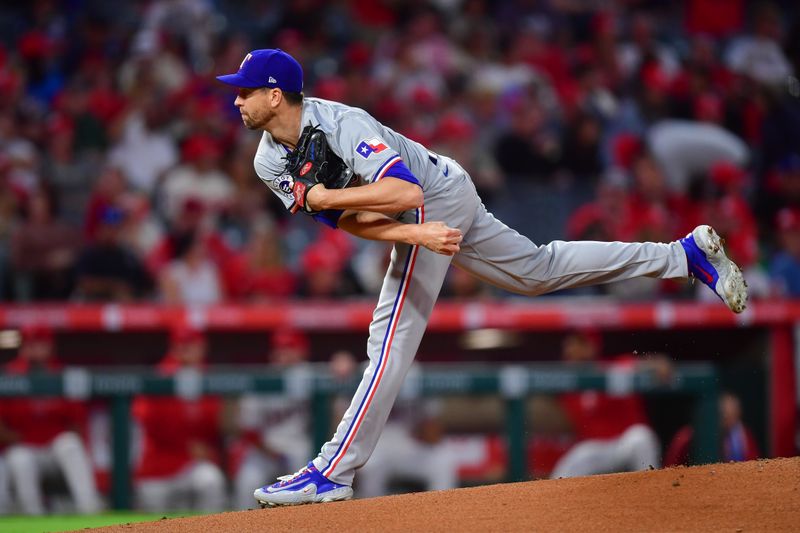 Sep 27, 2024; Anaheim, California, USA; Texas Rangers pitcher Jacob deGrom (48) throws against the Los Angeles Angels during the first inning at Angel Stadium. Mandatory Credit: Gary A. Vasquez-Imagn Images