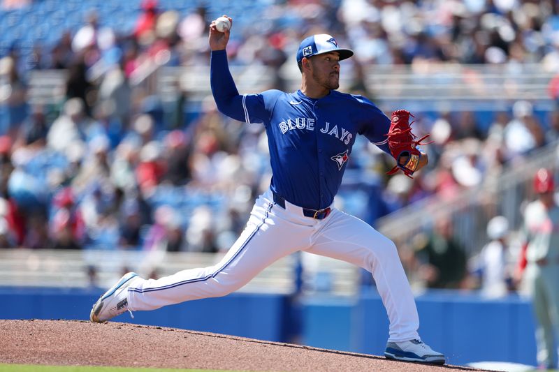 Mar 21, 2025; Dunedin, Florida, USA; Toronto Blue Jays pitcher Jose Berrios (17) throws a pitch against the Philadelphia Phillies in the first inning during spring training at TD Ballpark. Mandatory Credit: Nathan Ray Seebeck-Imagn Images