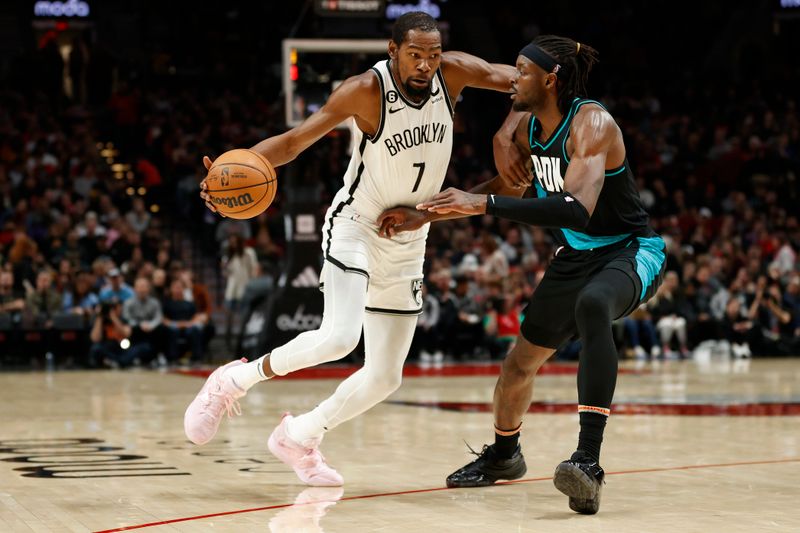 PORTLAND, OREGON - NOVEMBER 17: Kevin Durant #7 of the Brooklyn Nets dribbles against Jerami Grant #9 of the Portland Trail Blazers during the third quarter at Moda Center on November 17, 2022 in Portland, Oregon. NOTE TO USER: User expressly acknowledges and agrees that, by downloading and or using this photograph, User is consenting to the terms and conditions of the Getty Images License Agreement. (Photo by Steph Chambers/Getty Images)