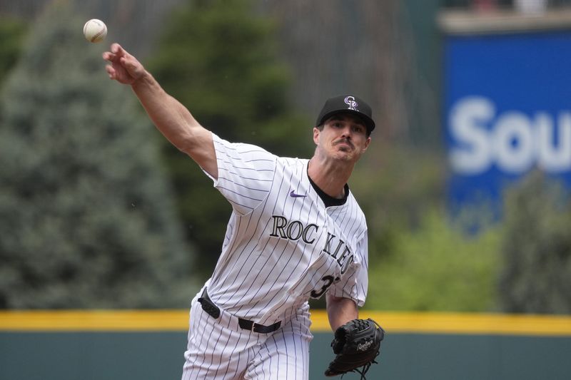 Apr 25, 2024; Denver, Colorado, USA; Colorado Rockies starting pitcher Dakota Hudson (32) delivers a pitch in the first inning against the San Diego Padres at Coors Field. Mandatory Credit: Ron Chenoy-USA TODAY Sports