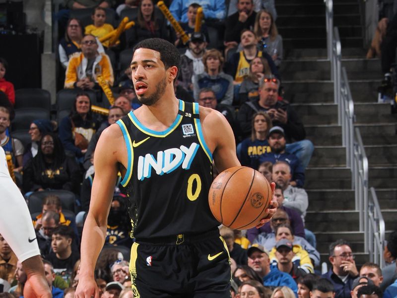 INDIANAPOLIS, IN - APRIL 5:  Tyrese Haliburton #0 of the Indiana Pacers handles the ball during the game  on April 5, 2024 at Gainbridge Fieldhouse in Indianapolis, Indiana. NOTE TO USER: User expressly acknowledges and agrees that, by downloading and or using this Photograph, user is consenting to the terms and conditions of the Getty Images License Agreement. Mandatory Copyright Notice: Copyright 2024 NBAE (Photo by Ron Hoskins/NBAE via Getty Images)