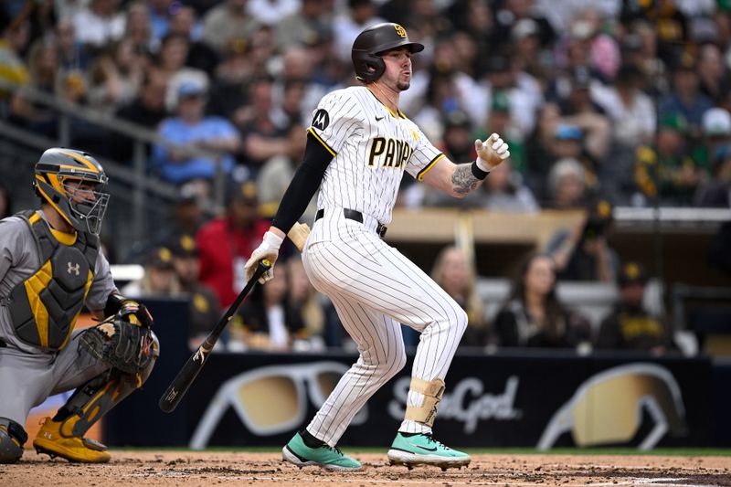 Jun 10, 2024; San Diego, California, USA; San Diego Padres center fielder Jackson Merrill (3) hits a single against the Oakland Athletics during the second inning at Petco Park. Mandatory Credit: Orlando Ramirez-USA TODAY Sports