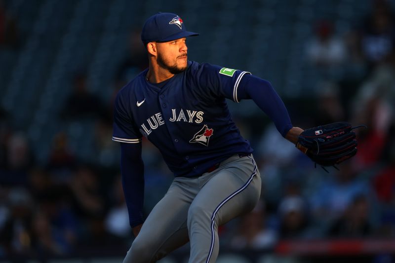 May 7, 2025; Anaheim, California, USA;  Toronto Blue Jays starting pitcher Jose Berrios (17) pitches during the second inning against the Los Angeles Angels at Angel Stadium. Mandatory Credit: Kiyoshi Mio-Imagn Images