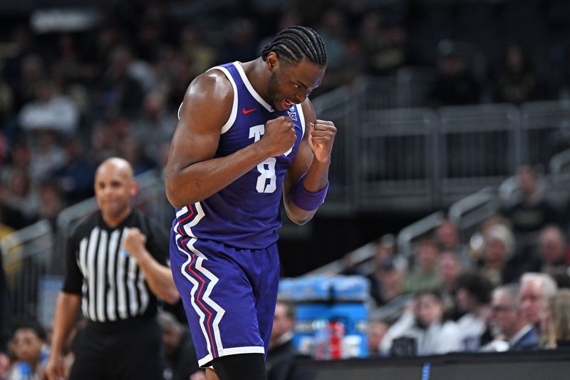 Mar 22, 2024; Indianapolis, IN, USA; TCU Horned Frogs center Ernest Udeh Jr. (8) reacts after a play in the first round of the 2024 NCAA Tournament at Gainbridge FieldHouse. Mandatory Credit: Robert Goddin-USA TODAY Sports