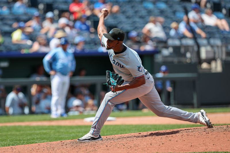 Jun 26, 2024; Kansas City, Missouri, USA; Miami Marlins pitcher Huascar Brazoban (31) throws against the Kansas City Royals during the eighth inning at Kauffman Stadium. Mandatory Credit: William Purnell-USA TODAY Sports