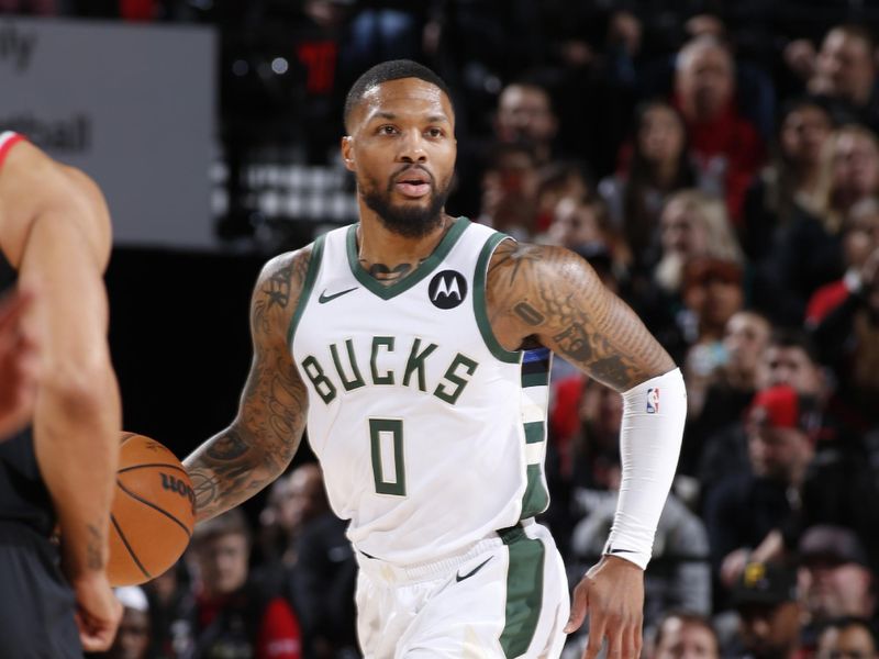 PORTLAND, OR - JANUARY 31:  Damian Lillard #0 of the Milwaukee Bucks handles the ball during the game  on January 31, 2024 at the Moda Center Arena in Portland, Oregon. NOTE TO USER: User expressly acknowledges and agrees that, by downloading and or using this photograph, user is consenting to the terms and conditions of the Getty Images License Agreement. Mandatory Copyright Notice: Copyright 2024 NBAE (Photo by Cameron Browne/NBAE via Getty Images)