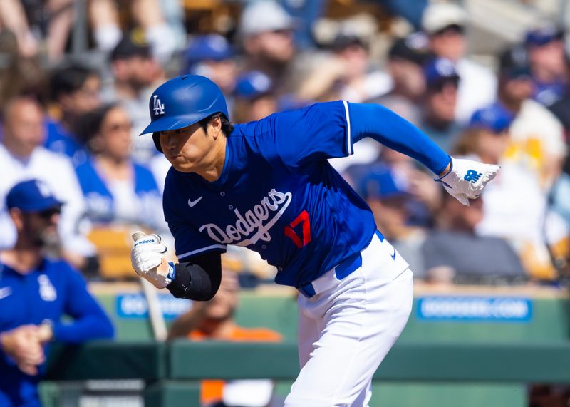 Mar 3, 2024; Phoenix, Arizona, USA; Los Angeles Dodgers designated hitter Shohei Ohtani against the Colorado Rockies during a spring training game at Camelback Ranch-Glendale. Mandatory Credit: Mark J. Rebilas-USA TODAY Sports