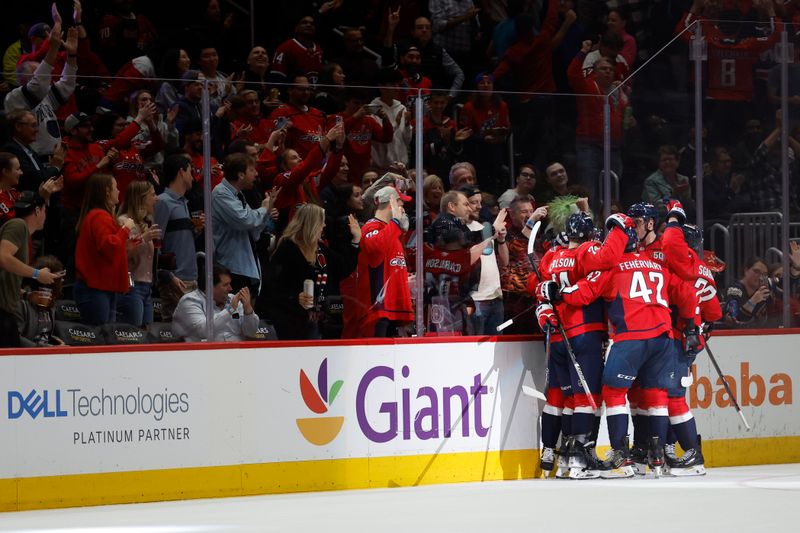 Oct 31, 2024; Washington, District of Columbia, USA; Washington Capitals left wing Jakub Vrana (13) celebrates with teammates after scoring a goal against the Montreal Canadiens in the second period at Capital One Arena. Mandatory Credit: Geoff Burke-Imagn Images