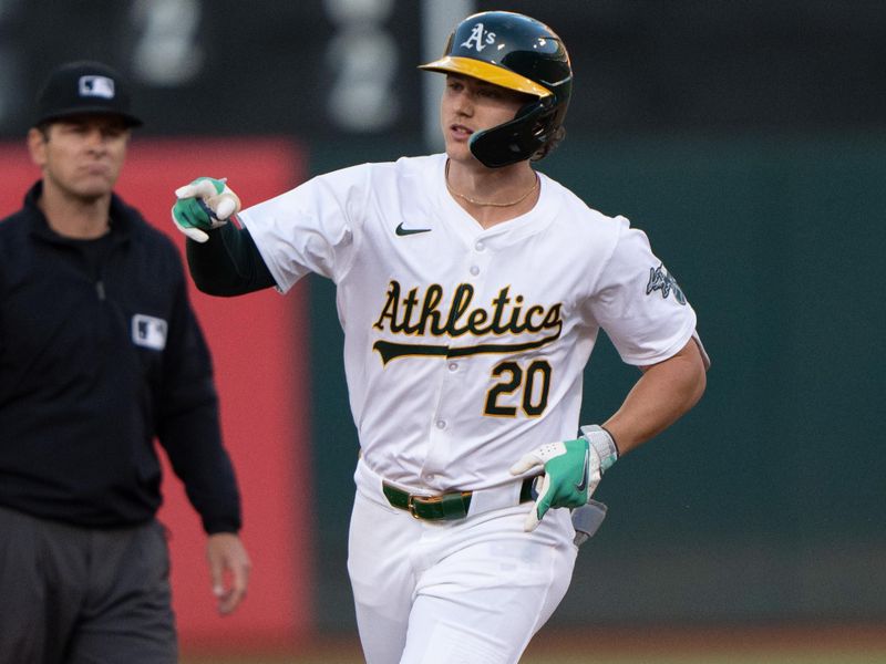 Jul 23, 2024; Oakland, California, USA;  Oakland Athletics second base Zack Gelof (20) reacts to the bullpen after hitting a solo home run during the fourth inning against the Houston Astros at Oakland-Alameda County Coliseum. Mandatory Credit: Stan Szeto-USA TODAY Sports