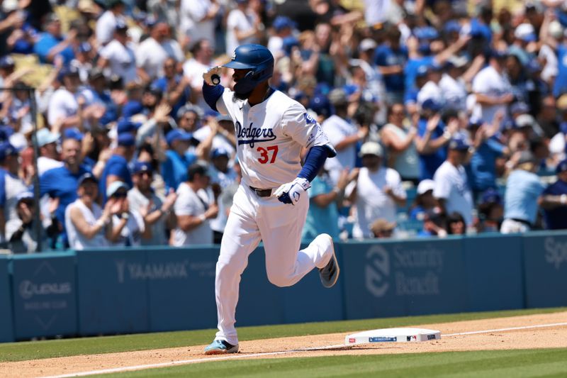 May 8, 2024; Los Angeles, California, USA;  Los Angeles Dodgers outfielder Teoscar Hernandez (37) runs the bases after hitting a two-run home run during the sixth inning against the Miami Marlins at Dodger Stadium. Mandatory Credit: Kiyoshi Mio-USA TODAY Sports