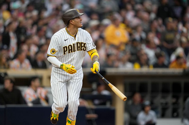 Jun 14, 2023; San Diego, California, USA;  San Diego Padres third baseman Manny Machado (13) watches his home run against the Cleveland Guardians during the third inning at Petco Park. Mandatory Credit: Ray Acevedo-USA TODAY Sports