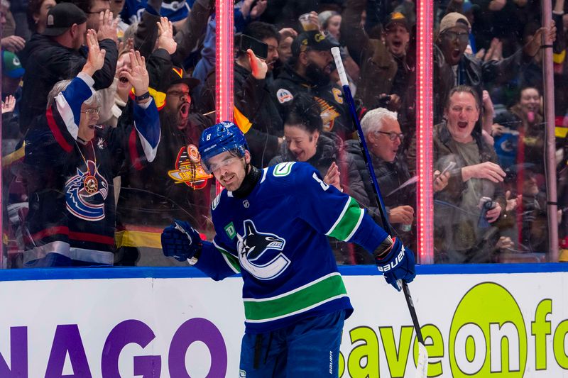 Apr 8, 2024; Vancouver, British Columbia, CAN;  Vancouver Canucks forward Conor Garland (8) celebrates his goal against the Vegas Golden Knights in the first period  at Rogers Arena. Mandatory Credit: Bob Frid-USA TODAY Sports