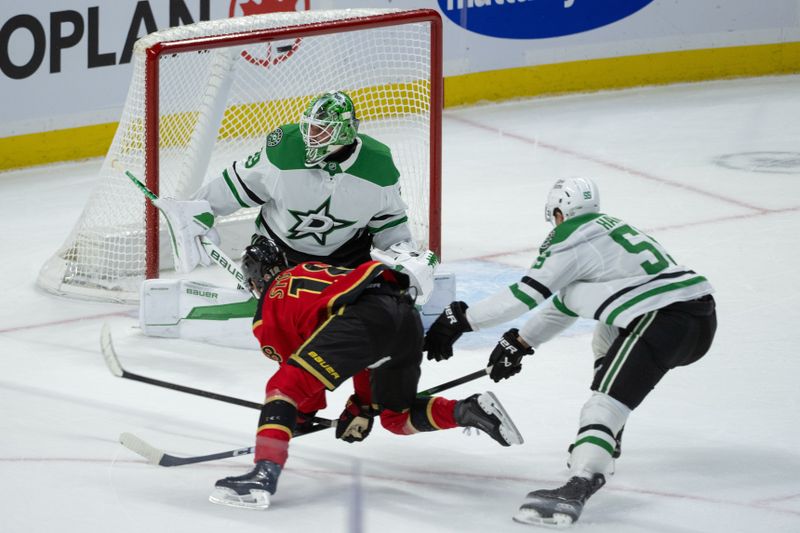 Nov 11, 2025; Ottawa, Ontario, CAN; Ottawa Senators center Tim Stutzle (18) hits the post on a shot against Dallas Stars goalie Jake Oettinger (29) in overtime at the Canadian Tire Centre. Mandatory Credit: Marc DesRosiers-IMAGN Images