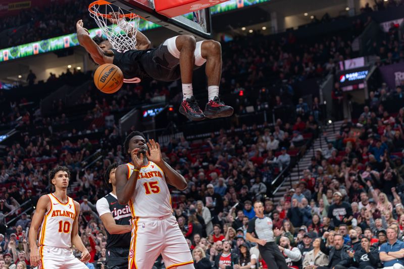 PORTLAND, OREGON - NOVEMBER 17:  Scoot Henderson #00 of the Portland Trail Blazers dunks against the Atlanta Hawks at Moda Center on November 17, 2024 in Portland, Oregon. The Trailblazers defeated the Hawks 114-110. NOTE TO USER: User expressly acknowledges and agrees that, by downloading and or using this photograph, User is consenting to the terms and conditions of the Getty Images License Agreement. (Photo by Tom Hauck/Getty Images)