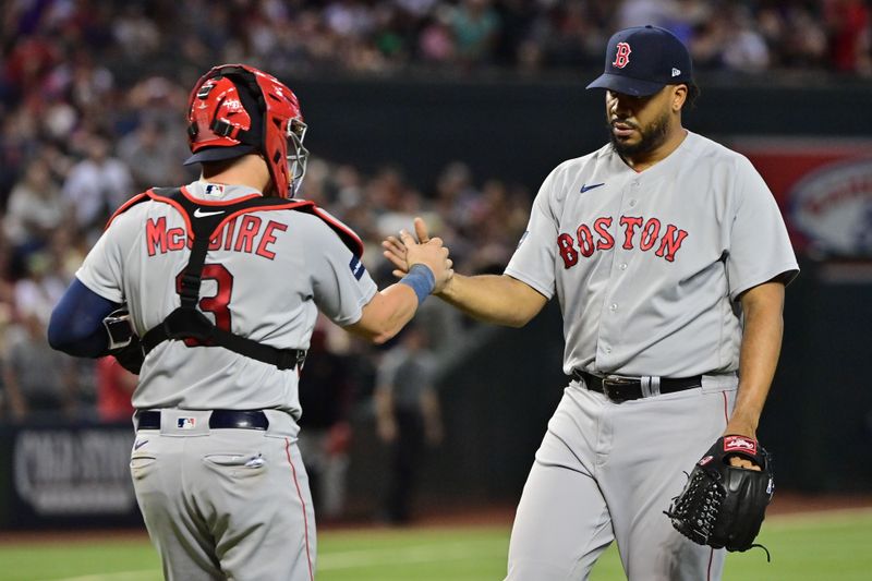 May 27, 2023; Phoenix, Arizona, USA;  Boston Red Sox relief pitcher Kenley Jansen (74) celebrates with catcher Reese McGuire (3) after defeating the Arizona Diamondbacks at Chase Field. Mandatory Credit: Matt Kartozian-USA TODAY Sports