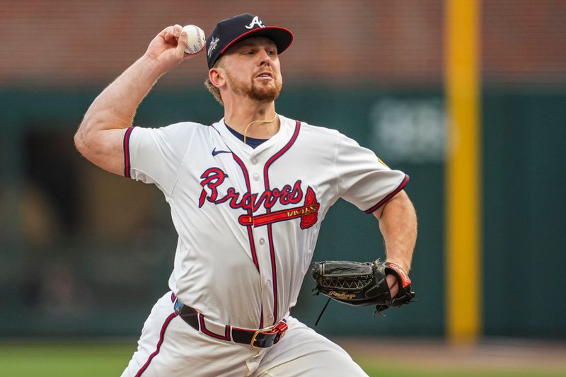 May 13, 2025; Cumberland, Georgia, USA; Atlanta Braves starting pitcher Spencer Schwellenbach (56) pitches against the Washington Nationals during the first inning at Truist Park. Mandatory Credit: Dale Zanine-Imagn Images