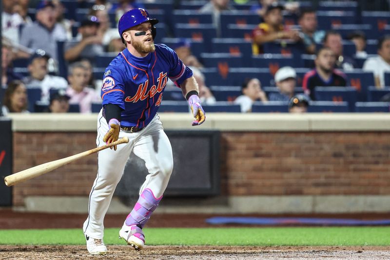 Jun 26, 2024; New York City, New York, USA;  New York Mets center fielder Harrison Bader (44) hits an RBI double in the fifth inning against the New York Yankees at Citi Field. Mandatory Credit: Wendell Cruz-USA TODAY Sports