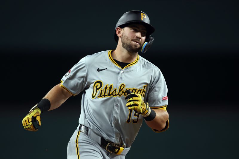 Aug 19, 2024; Arlington, Texas, USA; Pittsburgh Pirates third baseman Jared Triolo (19) rounds the bases after hitting a three-run home run against the Texas Rangers in the fourth inning at Globe Life Field. Mandatory Credit: Tim Heitman-USA TODAY Sports