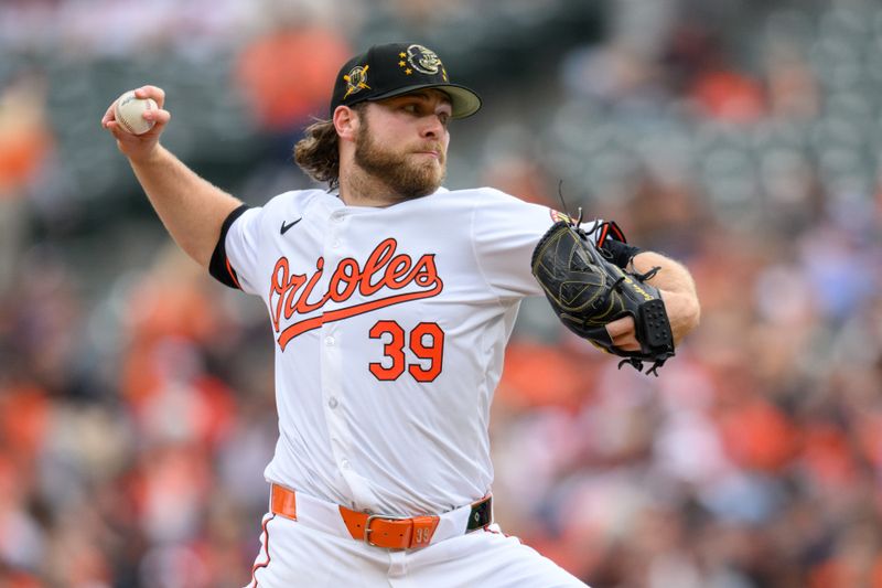 May 19, 2024; Baltimore, Maryland, USA; Baltimore Orioles pitcher Corbin Burnes (39) throws a pitch during the first inning against the Seattle Mariners at Oriole Park at Camden Yards. Mandatory Credit: Reggie Hildred-USA TODAY Sports