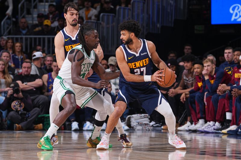 DENVER, CO - JANUARY 7: Jamal Murray #27 of the Denver Nuggets looks to pass the ball during the game against the Boston Celtics on January 7, 2025 at Ball Arena in Denver, Colorado. NOTE TO USER: User expressly acknowledges and agrees that, by downloading and/or using this Photograph, user is consenting to the terms and conditions of the Getty Images License Agreement. Mandatory Copyright Notice: Copyright 2025 NBAE (Photo by Bart Young/NBAE via Getty Images)