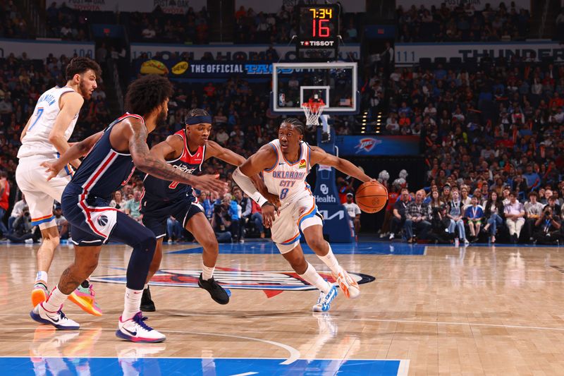 OKLAHOMA CITY, OK - FEBRUARY 23: Jalen Williams #8 of the Oklahoma City Thunder handles the ball during the game against the Washington Wizards on February 23, 2024 at Paycom Arena in Oklahoma City, Oklahoma. NOTE TO USER: User expressly acknowledges and agrees that, by downloading and or using this photograph, User is consenting to the terms and conditions of the Getty Images License Agreement. Mandatory Copyright Notice: Copyright 2024 NBAE (Photo by Zach Beeker/NBAE via Getty Images)