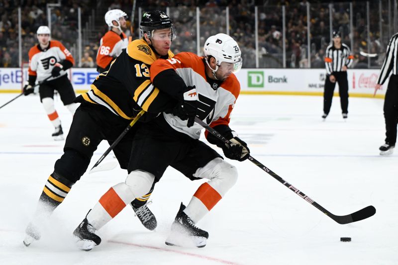 Oct 29, 2024; Boston, Massachusetts, USA; Boston Bruins center Charlie Coyle (13) defends Philadelphia Flyers center Ryan Poehling (25) during the second period at TD Garden. Mandatory Credit: Brian Fluharty-Imagn Images