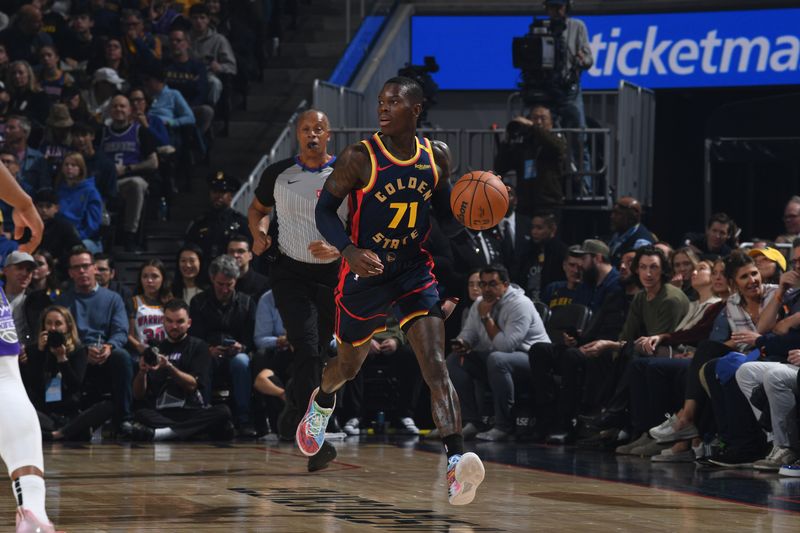 SAN FRANCISCO, CA - JANUARY 5:  Dennis Schroder #71 of the Golden State Warriors handles the ball during the game against the Sacramento Kings on January 5, 2025 at Chase Center in San Francisco, California. NOTE TO USER: User expressly acknowledges and agrees that, by downloading and or using this photograph, user is consenting to the terms and conditions of Getty Images License Agreement. Mandatory Copyright Notice: Copyright 2025 NBAE (Photo by Noah Graham/NBAE via Getty Images)