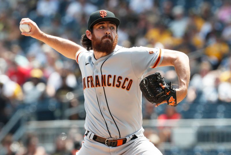 Jul 16, 2023; Pittsburgh, Pennsylvania, USA;  San Francisco Giants relief pitcher Ryan Walker (74) pitches against the Pittsburgh Pirates during the eighth inning at PNC Park. Mandatory Credit: Charles LeClaire-USA TODAY Sports