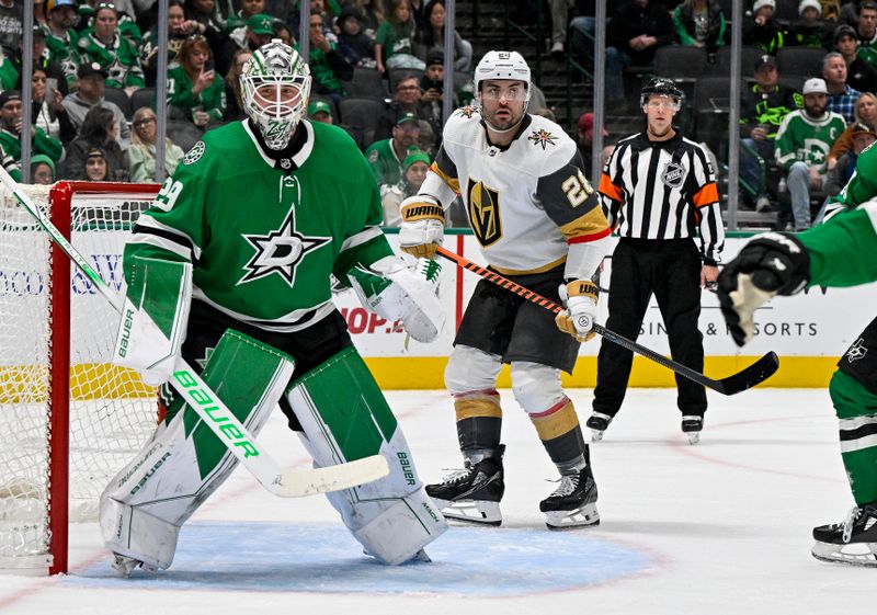 Dec 9, 2023; Dallas, Texas, USA; Dallas Stars goaltender Jake Oettinger (29) and Vegas Golden Knights left wing William Carrier (28) look for the puck in the Stars zone during the third period at the American Airlines Center. Mandatory Credit: Jerome Miron-USA TODAY Sports