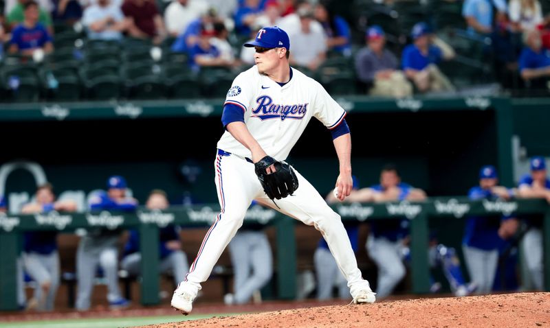 May 27, 2025; Arlington, Texas, USA; Texas Rangers relief pitcher Robert Garcia (62) throws during the ninth inning against the Toronto Blue Jays at Globe Life Field. Mandatory Credit: Kevin Jairaj-Imagn Images