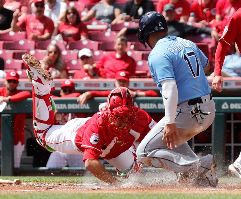 Apr 19, 2023; Cincinnati, Ohio, USA; Tampa Bay Rays third baseman Isaac Paredes (17) scores against Cincinnati Reds catcher Luke Maile (22) during the first inning at Great American Ball Park. Mandatory Credit: David Kohl-USA TODAY Sports