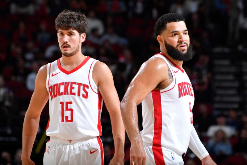 HOUSTON, TX - OCTOBER 17: Reed Sheppard #15 and Fred VanVleet #5 of the Houston Rockets looks on during the game against the San Antonio Spurs on October 17, 2024 at the Toyota Center in Houston, Texas. NOTE TO USER: User expressly acknowledges and agrees that, by downloading and or using this photograph, User is consenting to the terms and conditions of the Getty Images License Agreement. Mandatory Copyright Notice: Copyright 2024 NBAE (Photo by Logan Riely/NBAE via Getty Images)