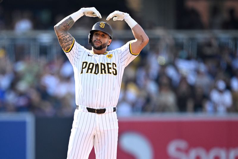 Jul 13, 2024; San Diego, California, USA; San Diego Padres right fielder David Peralta (24) celebrates after hitting an RBI double against the Atlanta Braves during the second inning at Petco Park. Mandatory Credit: Orlando Ramirez-USA TODAY Sports 