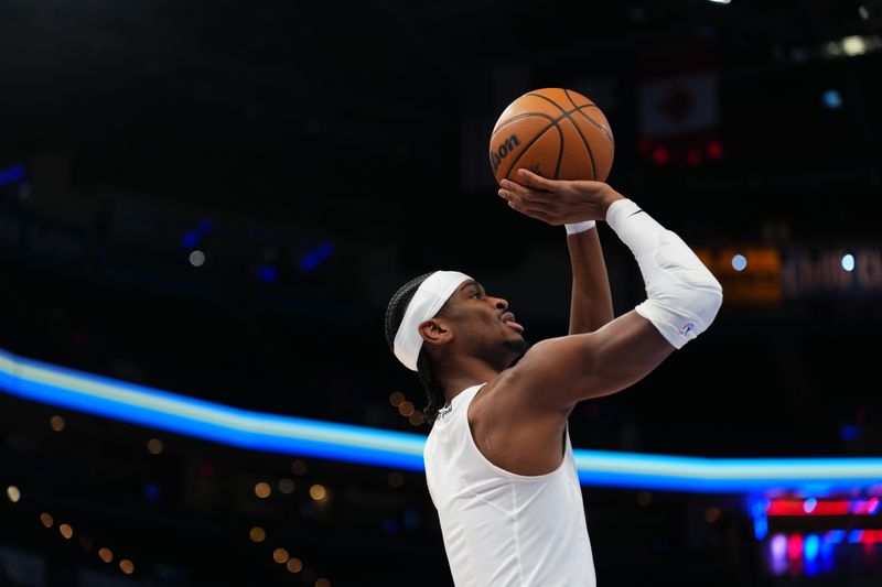 OKLAHOMA CITY, OK - FEBRUARY 3: Shai Gilgeous-Alexander #2 of the Oklahoma City Thunder warms up before the game against the Milwaukee Bucks on February 3, 2025 at Paycom Center in Oklahoma City, Oklahoma. NOTE TO USER: User expressly acknowledges and agrees that, by downloading and or using this photograph, User is consenting to the terms and conditions of the Getty Images License Agreement. Mandatory Copyright Notice: Copyright 2025 NBAE (Photo by Cooper Neill/NBAE via Getty Images)