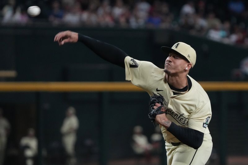 Sep 10, 2024; Phoenix, Arizona, USA; Arizona Diamondbacks pitcher Justin Martinez (63) throws against the Texas Rangers in the ninth inning at Chase Field. Mandatory Credit: Rick Scuteri-Imagn Images