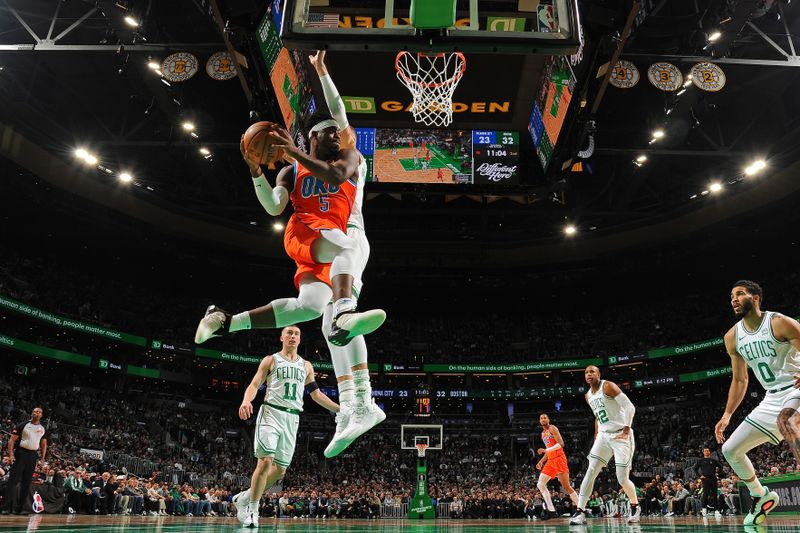 BOSTON, MA - APRIL 3: Luguentz Dort #5 of the Oklahoma City Thunder passes the ball during the game against the Boston Celtics on April 3, 2024 at the TD Garden in Boston, Massachusetts. NOTE TO USER: User expressly acknowledges and agrees that, by downloading and or using this photograph, User is consenting to the terms and conditions of the Getty Images License Agreement. Mandatory Copyright Notice: Copyright 2024 NBAE  (Photo by Brian Babineau/NBAE via Getty Images)