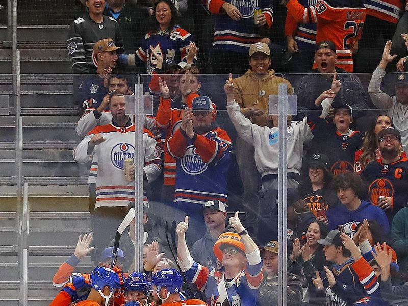 Oct 12, 2024; Edmonton, Alberta, CAN; The Edmonton Oilers celebrate a goal scored by forward Corey Perry (90) during the second period against the Chicago Blackhawks at Rogers Place. Mandatory Credit: Perry Nelson-Imagn Images