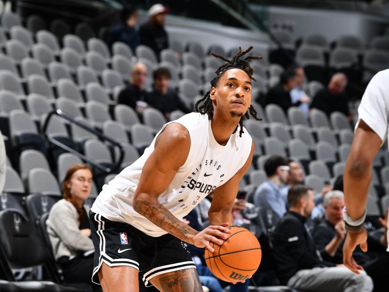 SAN ANTONIO, TX - JANUARY 15: Devin Vassell #24 of the San Antonio Spurs warms up before the game against the Memphis Grizzlies on January 15, 2025 at the Frost Bank Center in San Antonio, Texas. NOTE TO USER: User expressly acknowledges and agrees that, by downloading and or using this photograph, user is consenting to the terms and conditions of the Getty Images License Agreement. Mandatory Copyright Notice: Copyright 2025 NBAE (Photos by Barry Gossage/NBAE via Getty Images)