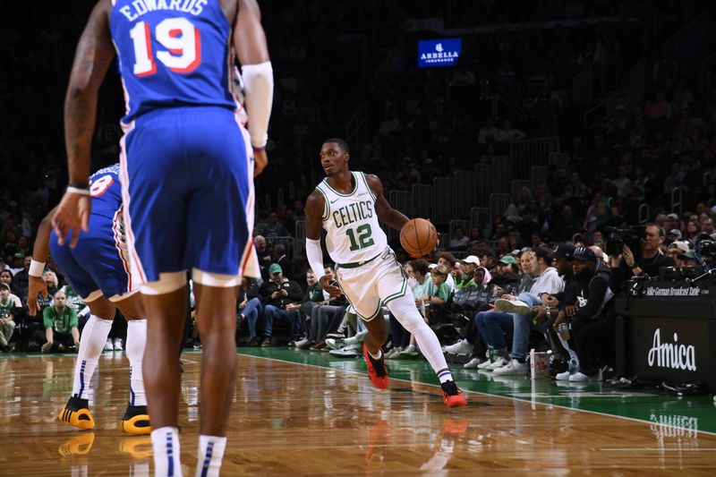 BOSTON, MA - OCTOBER 12: Lonnie Walker IV #12 of the Boston Celtics handles the ball during the game against the Philadelphia 76ers during a NBA Preseason game on October 12, 2024 at TD Garden in Boston, Massachusetts. NOTE TO USER: User expressly acknowledges and agrees that, by downloading and/or using this Photograph, user is consenting to the terms and conditions of the Getty Images License Agreement. Mandatory Copyright Notice: Copyright 2024 NBAE (Photo by Brian Babineau/NBAE via Getty Images)