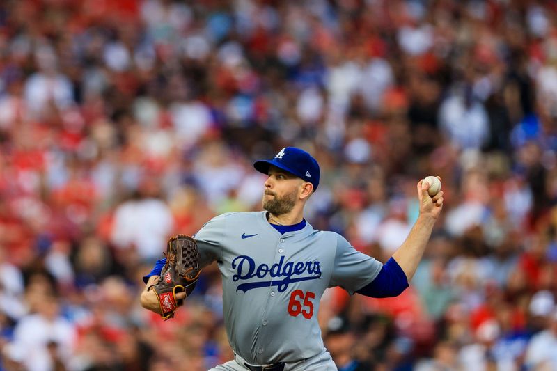 May 24, 2024; Cincinnati, Ohio, USA; Los Angeles Dodgers starting pitcher James Paxton (65) pitches against the Cincinnati Reds in the first inning at Great American Ball Park. Mandatory Credit: Katie Stratman-USA TODAY Sports