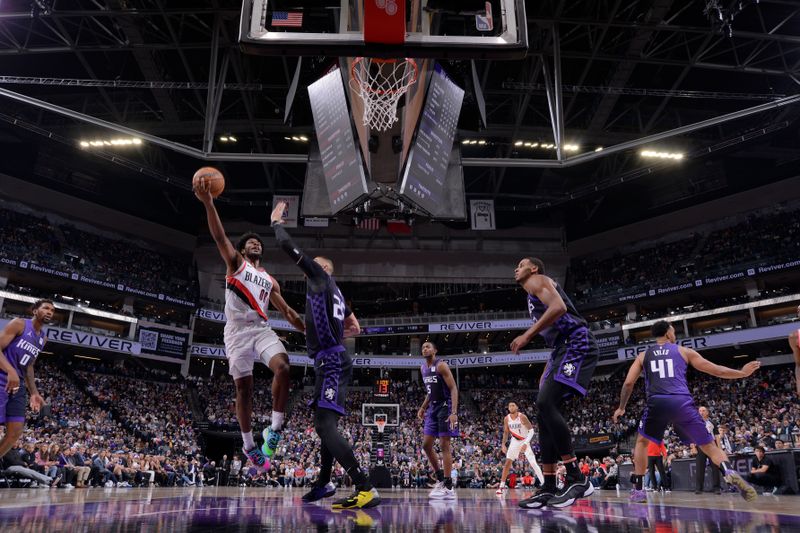 SACRAMENTO, CA - OCTOBER 28: Scoot Henderson #00 of the Portland Trail Blazers drives to the basket during the game against the Sacramento Kings on October 28, 2024 at Golden 1 Center in Sacramento, California. NOTE TO USER: User expressly acknowledges and agrees that, by downloading and or using this Photograph, user is consenting to the terms and conditions of the Getty Images License Agreement. Mandatory Copyright Notice: Copyright 2024 NBAE (Photo by Rocky Widner/NBAE via Getty Images)