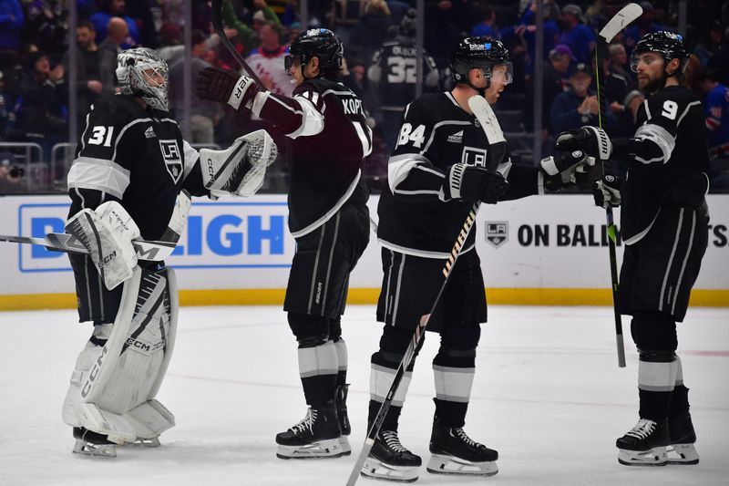 Jan 20, 2024; Los Angeles, California, USA; Los Angeles Kings celebrate the victory against the New York Rangers at Crypto.com Arena. Mandatory Credit: Gary A. Vasquez-USA TODAY Sports