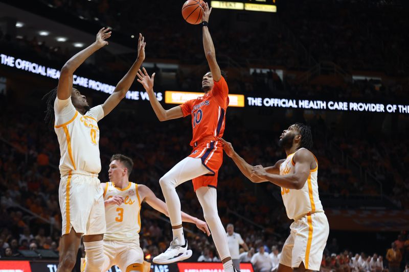 Feb 28, 2024; Knoxville, Tennessee, USA; Auburn Tigers guard Chad Baker-Mazara (10) goes to the basket against the Tennessee Volunteers during the first half at Thompson-Boling Arena at Food City Center. Mandatory Credit: Randy Sartin-USA TODAY Sports