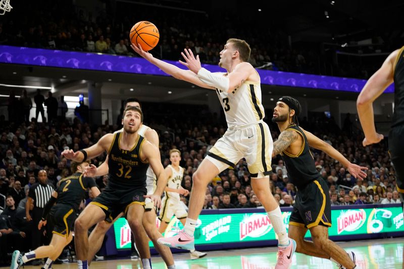 Dec 1, 2023; Evanston, Illinois, USA; Purdue Boilermakers guard Braden Smith (3) shoots the ball against the Northwestern Wildcats during the first half at Welsh-Ryan Arena. Mandatory Credit: David Banks-USA TODAY Sports