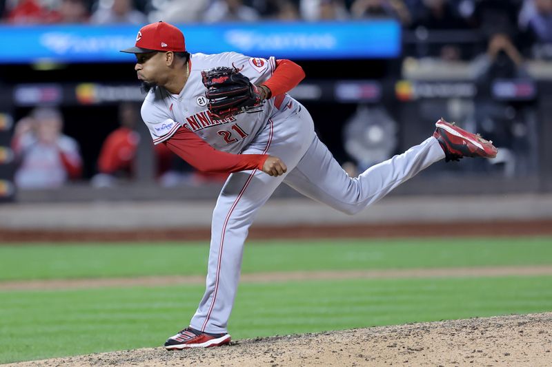 Sep 15, 2023; New York City, New York, USA; Cincinnati Reds relief pitcher Alexis Diaz follows through on a pitch against the New York Mets during the eighth inning at Citi Field. Mandatory Credit: Brad Penner-USA TODAY Sports